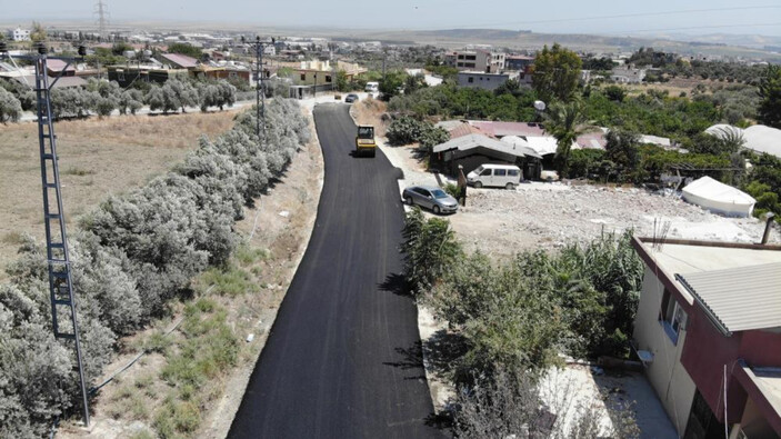 Depremin vurduğu Hatay'da hasar gören yollar asfaltlanıyor